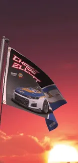 Race car flag against a vibrant sunset sky.