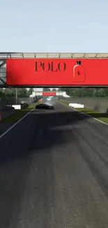 Racing track with red billboard and car.