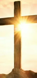 A radiant cross with sunburst at sunrise, symbolizing hope and faith.