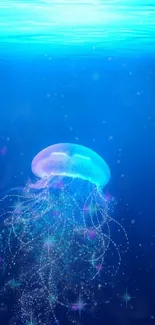 Glowing jellyfish in deep blue ocean water wallpaper.