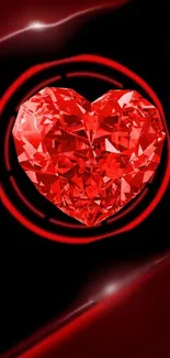 Vibrant red heart shaped gemstone with a dark background.