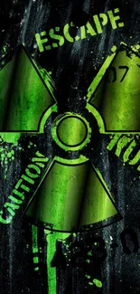 Green radiation symbol wallpaper on dark background.