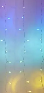 Colorful fairy light strings on a blue background.