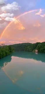 Rainbow over a serene lake with lush greenery and sunset. Perfect for nature lovers.