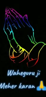 Colorful praying hands on black background with spiritual text.