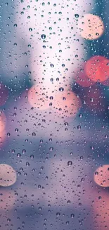 Raindrops on glass with colorful bokeh lights creating a serene background.