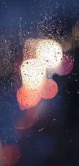 Bokeh night wallpaper with raindrops on a window and blurred lights.