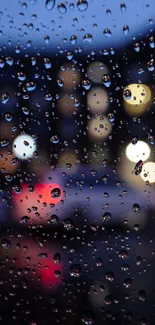 Glistening raindrops on a window with blurred city lights at night.