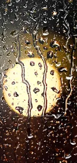 Raindrops on glass with a glowing light.