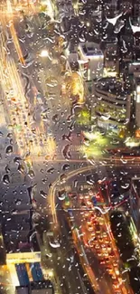 Raindrop-covered cityscape at night showcasing vibrant lights.