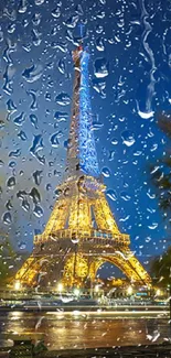 Eiffel Tower at night seen through raindrops on glass.