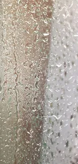 Close-up of raindrops on glass wallpaper.