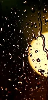 Mesmerizing golden raindrop wallpaper with warm glow background.
