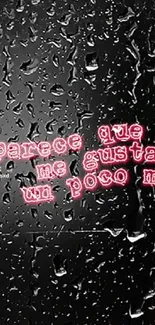 Neon pink text on black raindrop wallpaper.