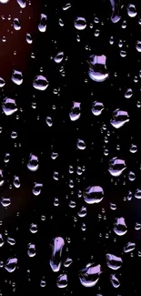 Elegant purple raindrops on a sleek, dark glass surface.