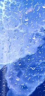 Blue wallpaper with raindrops on glass surface, creating a calm effect.