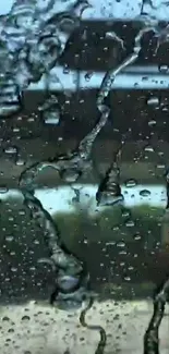 Raindrops on a glass window with a serene blue background.