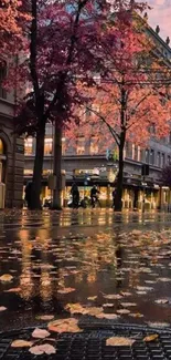 Autumn street with orange leaves and wet pavement in a serene city setting.