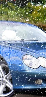 Blue sports car with raindrops on window.