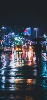 Vibrant rainy city street at night with neon lights and reflections.