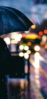 Silhouette with an umbrella in a rainy city street with blurred lights.