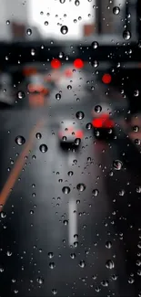 Rain droplets on window with blurry city lights in background.