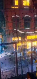 Rainy cityscape with illuminated windows viewed through a windowpane.
