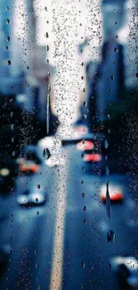 Blurred traffic through rainy city window at night.