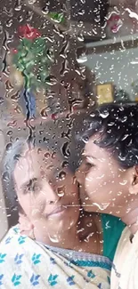 Mother and child sharing a tender moment behind rain-covered window.