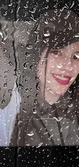 Mobile wallpaper with raindrops on window showing a serene portrait.