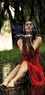 Woman in red dress sitting in rain, reflecting joy and serenity.