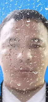 Face obscured by raindrops on a blue background wallpaper.