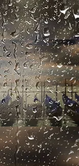 Gondolas at sunset through raindrop-covered glass.