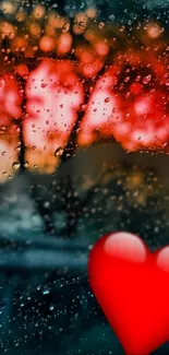 Heart and raindrops against a vibrant, red sunset on wallpaper.