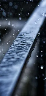 Dark blue metal surface with rain droplets.