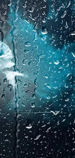 Abstract blue wallpaper with rain droplets on glass.