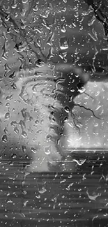 Black and white wallpaper with raindrops on glass window.