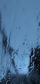 Blue themed rainy window phone wallpaper.