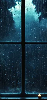 Rainy window view with a candle.