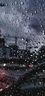 Rain droplets on a window with a city background.