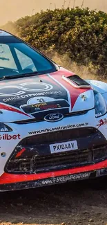 Rally car speeding on dirt track in dynamic motion.