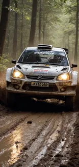 Rally car speeds through a muddy forest trail.