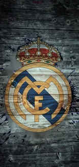 Real Madrid logo on wood texture with crown design wallpaper.