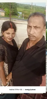 Family taking a selfie outdoors with Realme 11 Pro.