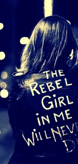 Rebel girl in a leather jacket on a dark city street wallpaper.