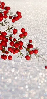 Red berries on a snowy background creating a peaceful winter scene.