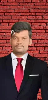 Man in suit against a red brick wall background.