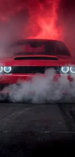 Red sports car emerging through smoke at night.