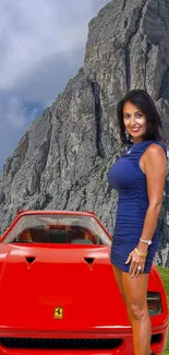 Woman in blue dress beside a red car with mountains in background.