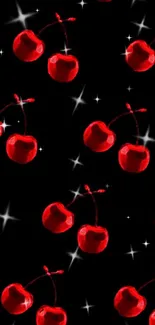 Red cherries sparkle on black background wallpaper.